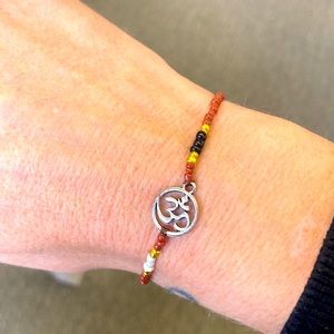 Gorgeous om charm skinny bracelet